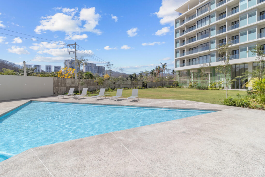 real-estate-experts-in-la-cruz-de-huanacaxtle-invest-safe-beach-condo-rental-income-well-posotioned-philos-la-cruz-real-estate-